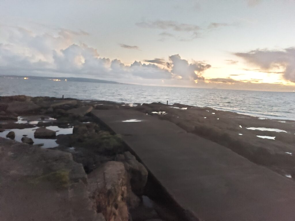 Jetty and rocky shore of Ballast Bank